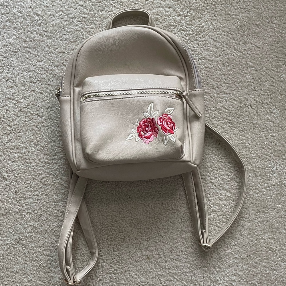 Mini backpack with embroidered flower